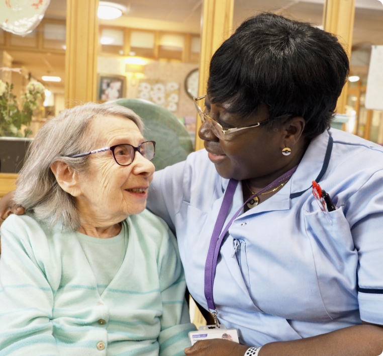 Engage Image showing a care home resident and member of staff