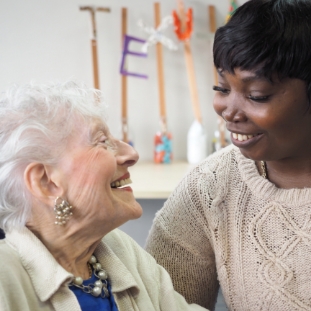 Engage | A member of the Beis Pinchos Staff interacting with a resident