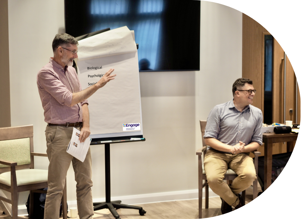 Engage | Andrew and Padraic completing a presentation