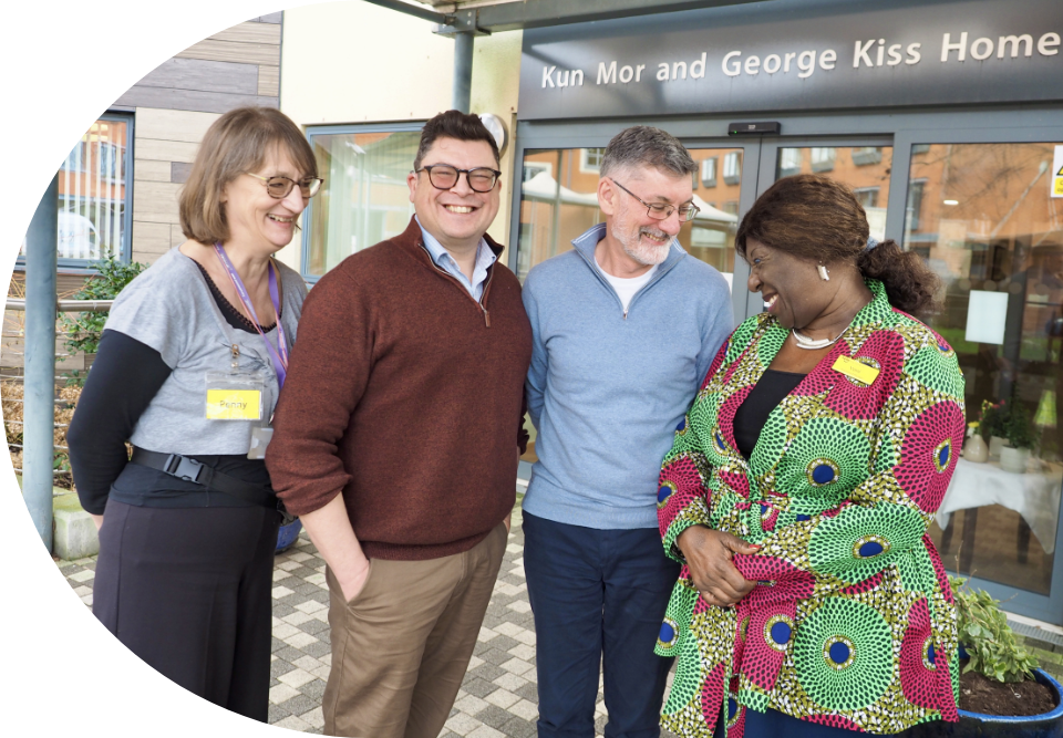 Engage | an image of the Engage team outside a care home