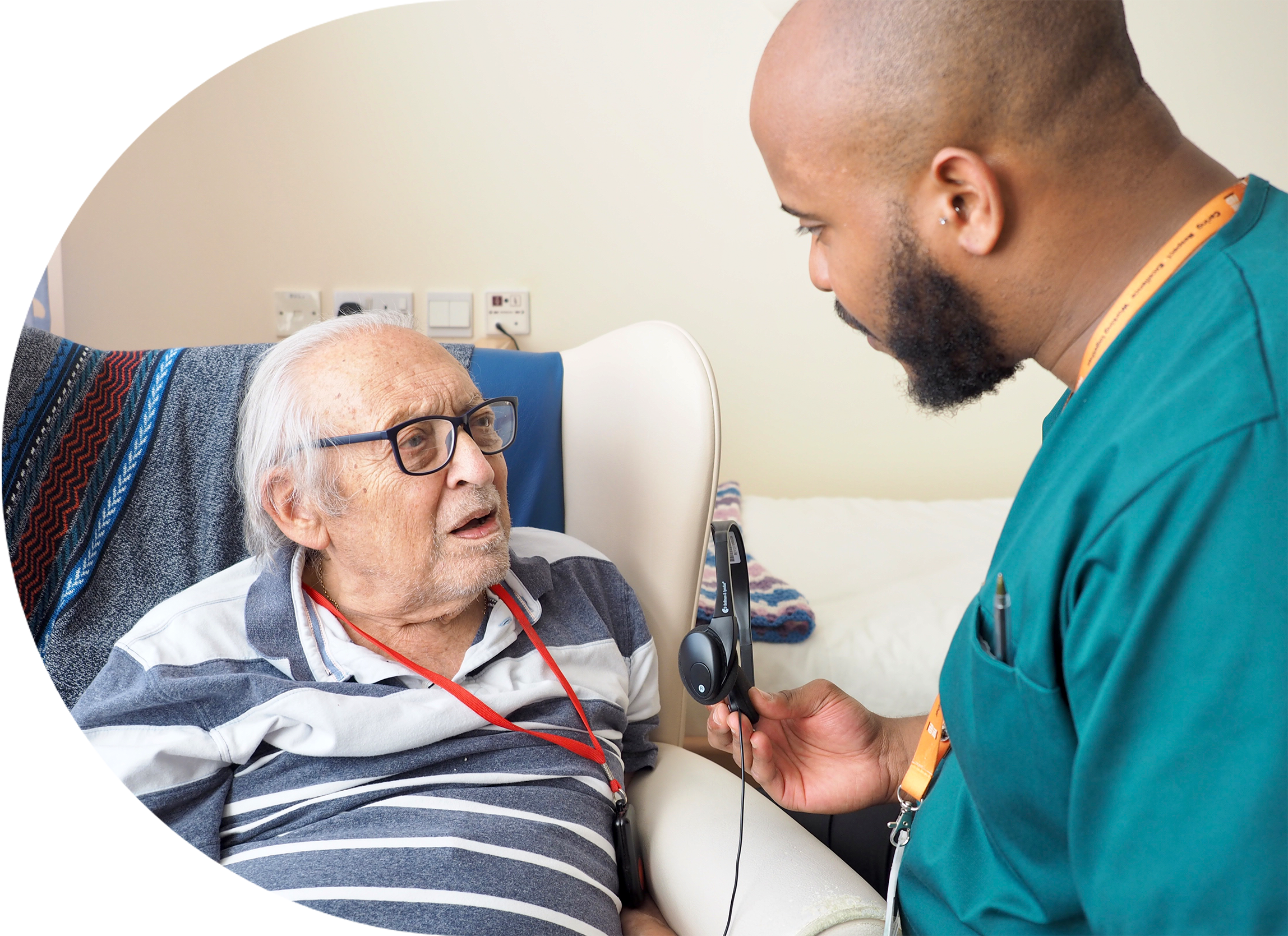 Engage | Heathland Village staff interacting with a resident